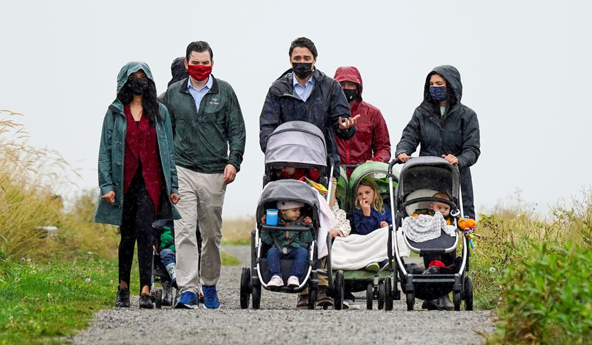 Justin Trudeau walks with families